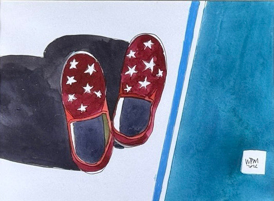 Red and navy star-pattern slip-on shoes with contrasting soles